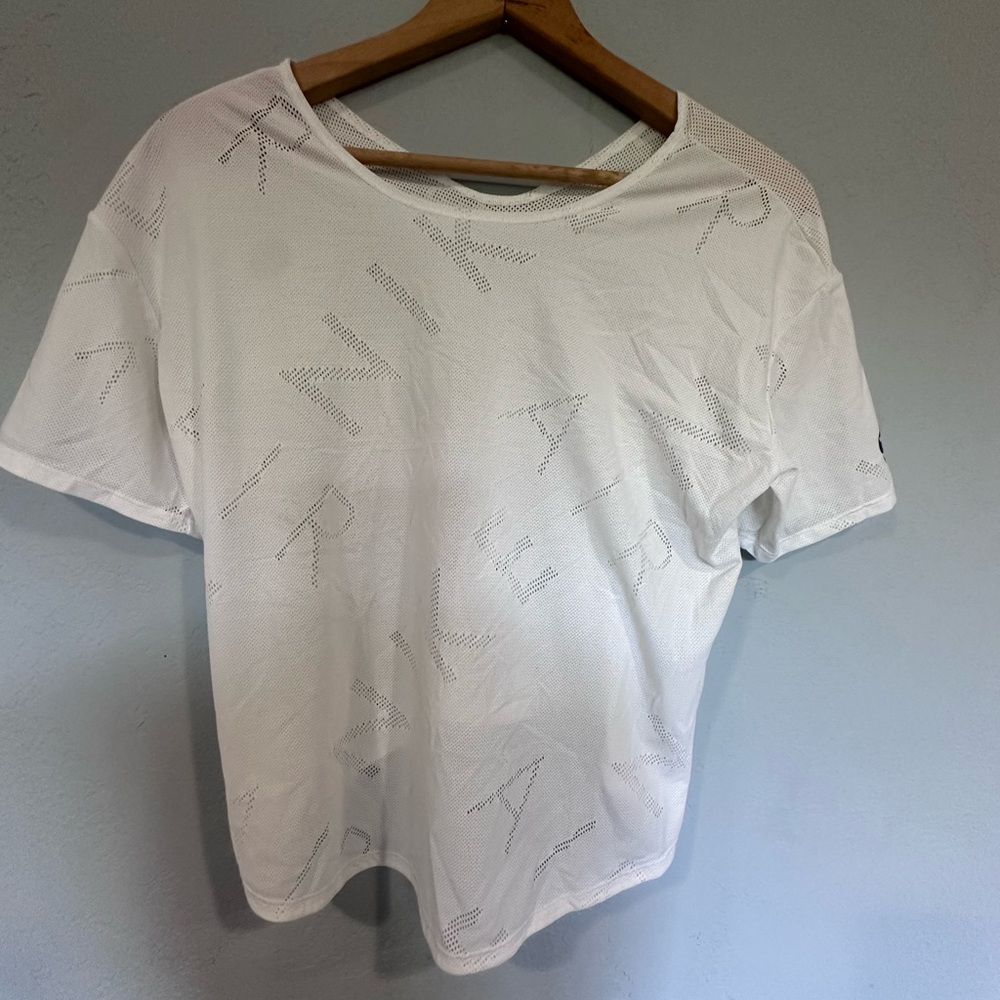 Nike White Short Sleeve Tee with Subtle Graphic